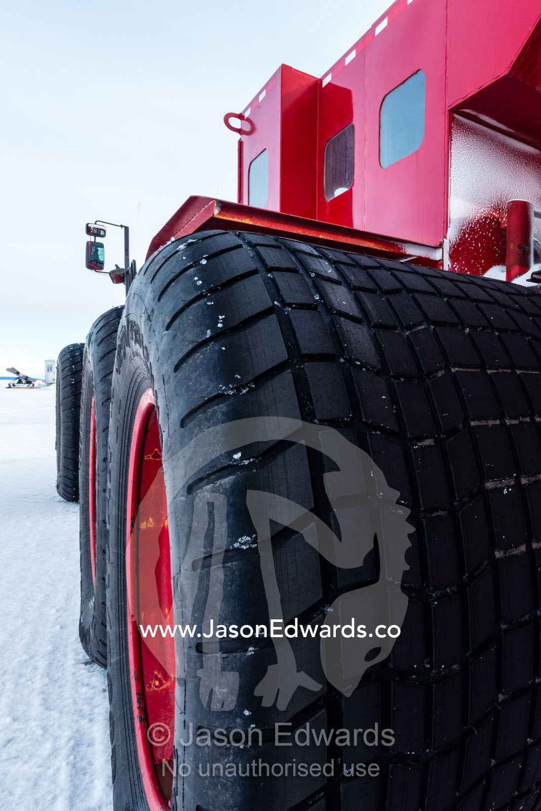 The tyre of the Kress, a large vehicle used to transport scientists and workers across the sea ice in Antarctica. Pegasus Field, Ross Island, McMurdo Sound, Antarctica.
