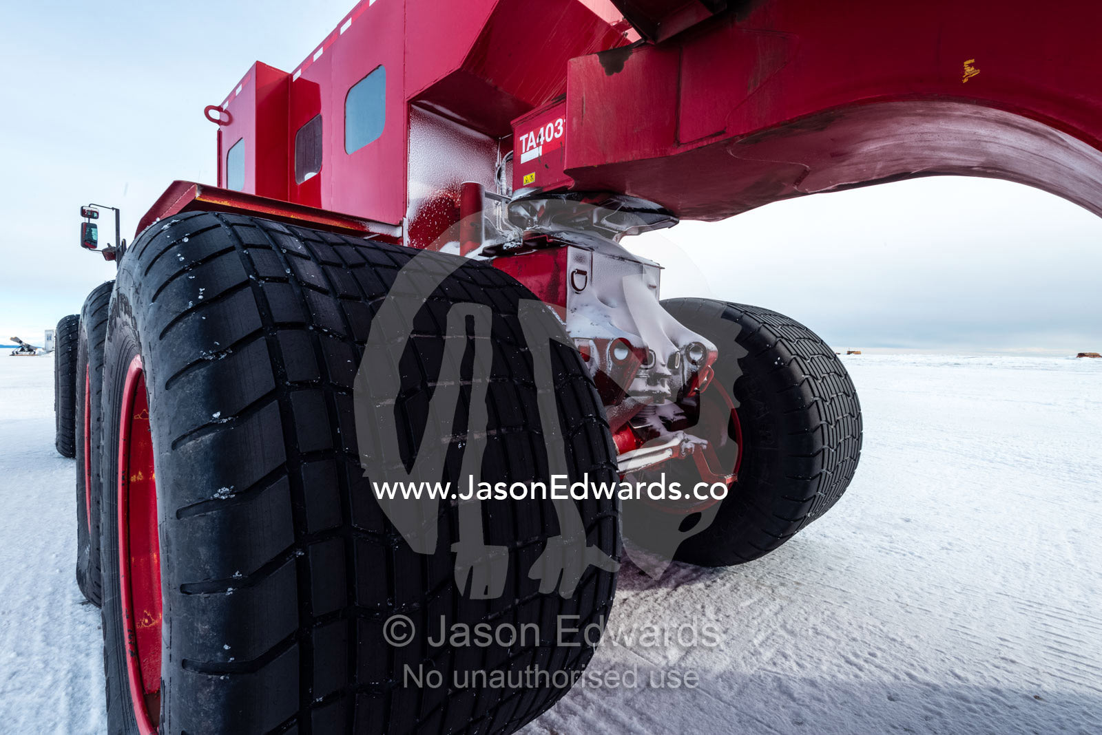The tyre of the Kress, a large vehicle used to transport scientists and workers across the sea ice in Antarctica. Pegasus Field, Ross Island, McMurdo Sound, Antarctica.