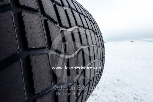 The tyre tread of the Kress, a large vehicle used to transport scientists and workers across the sea ice in Antarctica. Pegasus Field, Ross Island, McMurdo Sound, Antarctica.