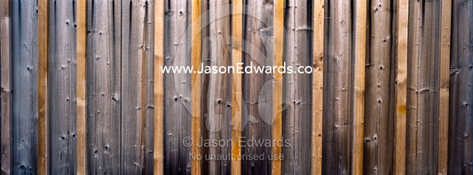 The weathered texture of wall timbers outside the hut of Antarctic explorer Ernest Shackleton. Shackleton's Hut, Cape Royds, Ross Island, Antarctica.