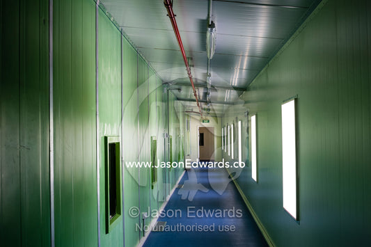 A long narrow insulated corridor in an Antarctic base. Scott Base, Pram Point, Hut Point Peninsula, Ross Island, Antarctica.