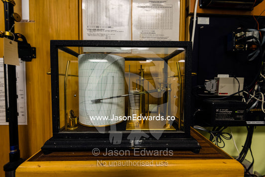 A Barograph measures barometric pressure in Antarctica. Hatherton Laboratory, Scott Base, Pram Point, Hut Point Peninsula, Ross Island, Antarctica.