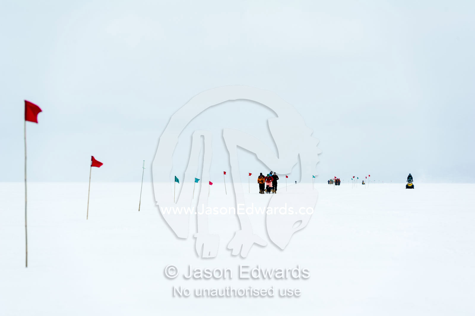 Teams of staff from Antarctic bases compete in a man haul race towing sleds across the frozen sea ice. Cape Armitage, McMurdo Sound, Ross Island, Antarctica.