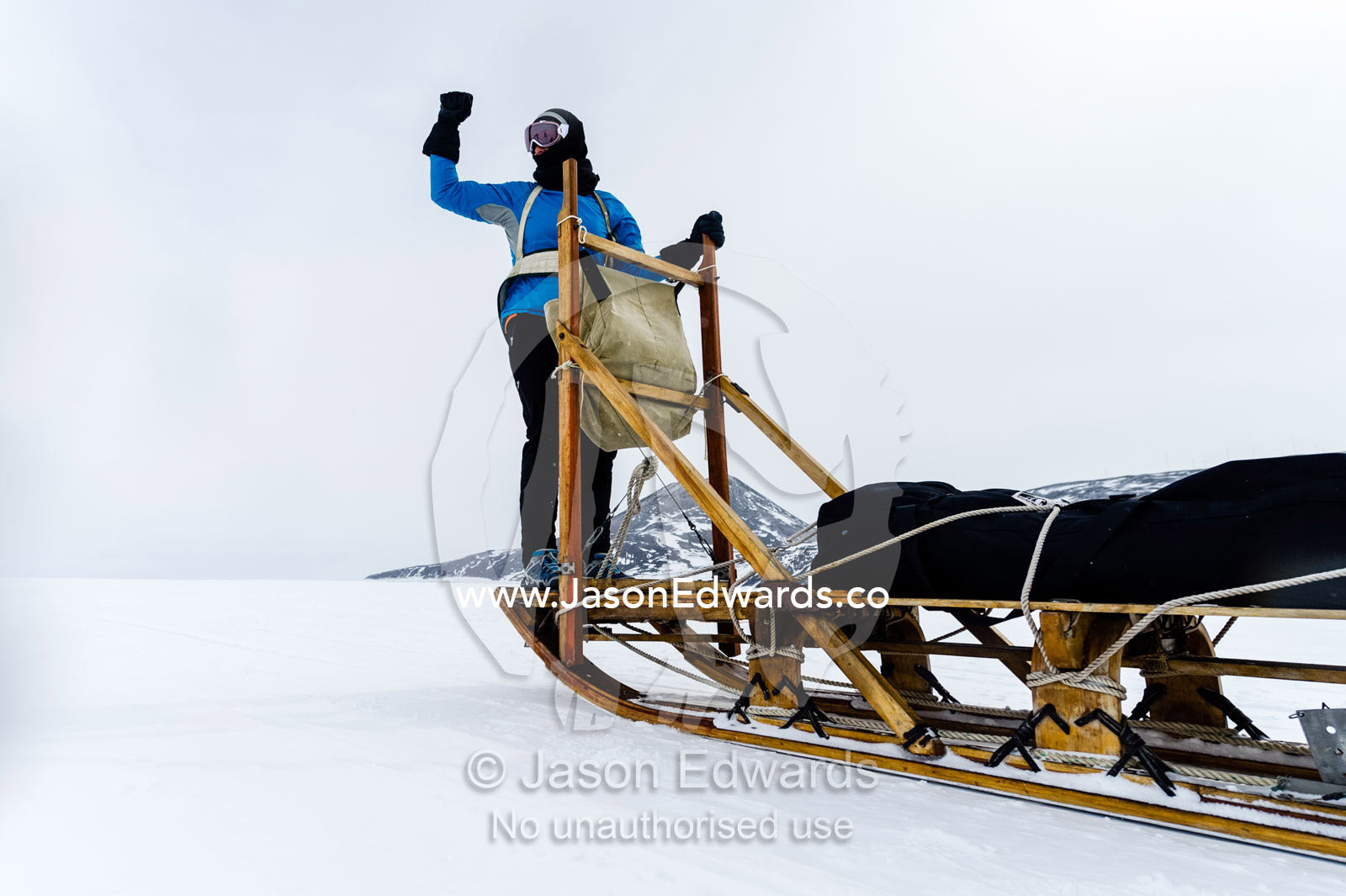 Teams of staff from Antarctic bases compete in a man haul race towing sleds across the frozen sea ice. Scott Base, Pram Point, Hut Point Peninsula, Ross Island, Antarctica.