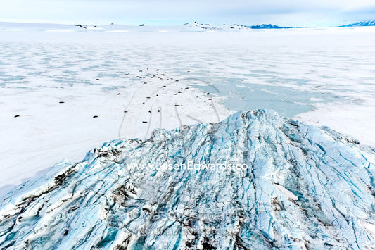 The fractured and tortured ice tongue of the Mt Erebus Glacier sweeps off the slopes of the active volcano. Pakaru Icefalls, South Bay, Ross Island, Antarctica.