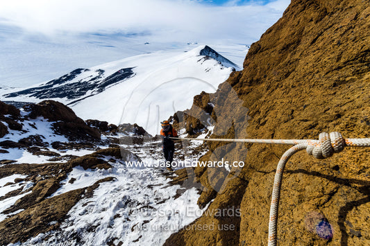 A knot in a climbing rope on a cliff in Antarctica. Castle Rock, Hut Point Peninsula, Ross Island, Antarctica.