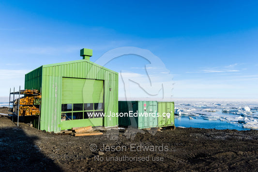 At Scott Base large garages and sheds house machinery to protect it from the cold weather. Scott Base, Pram Point, Hut Point Peninsula, Ross Island, Antarctica.