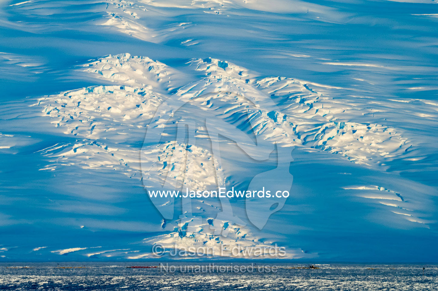 A giant crevasse field on the slopes of Mount Erebus an active volcano in Antarctica. Antarctica.