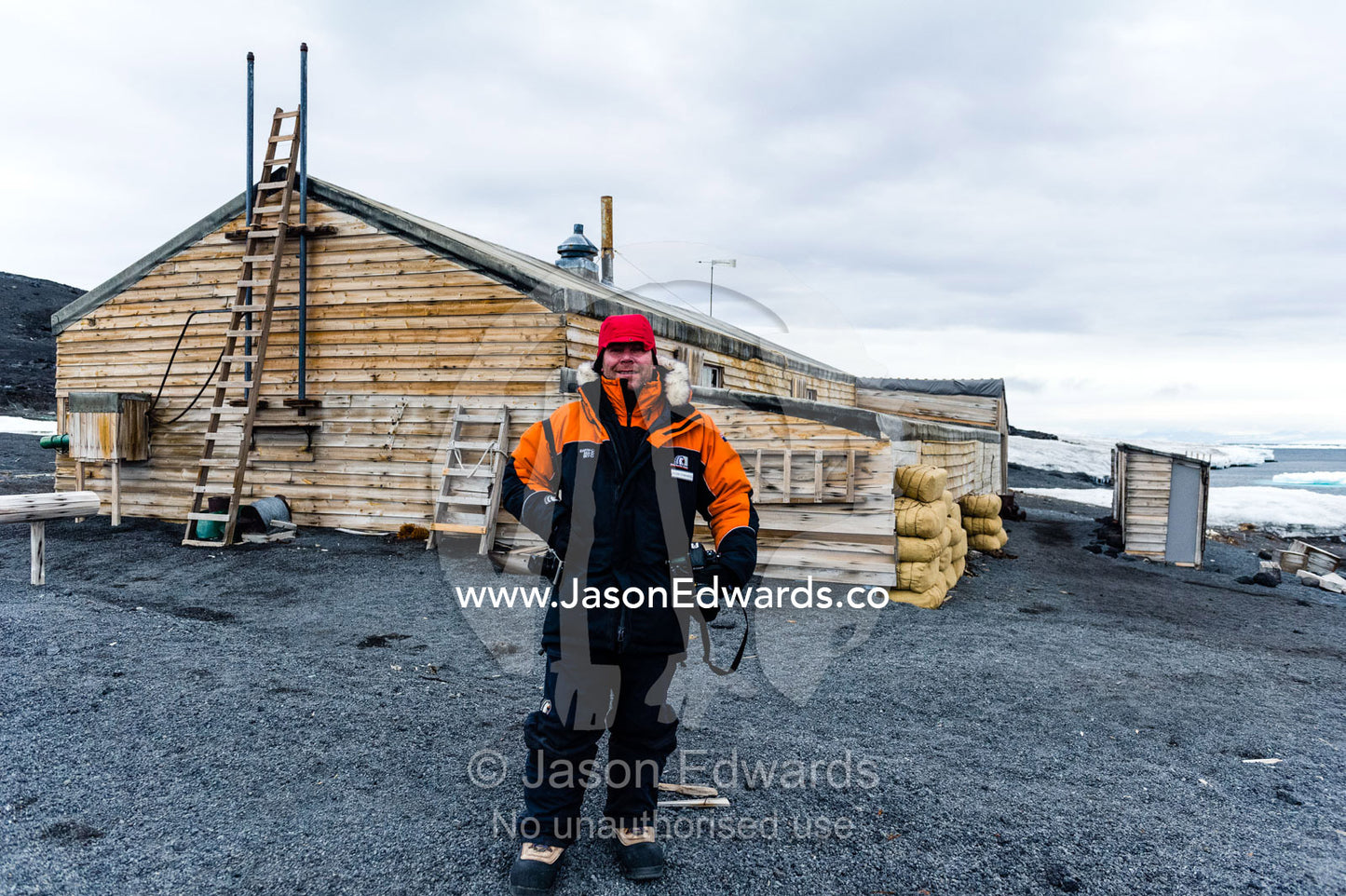 National Geographic photographer Jason Edwards at Robert Falcon Scott's Hut in Antarctica. Scott's Hut, Cape Evans, Ross Island, Antarctica.
