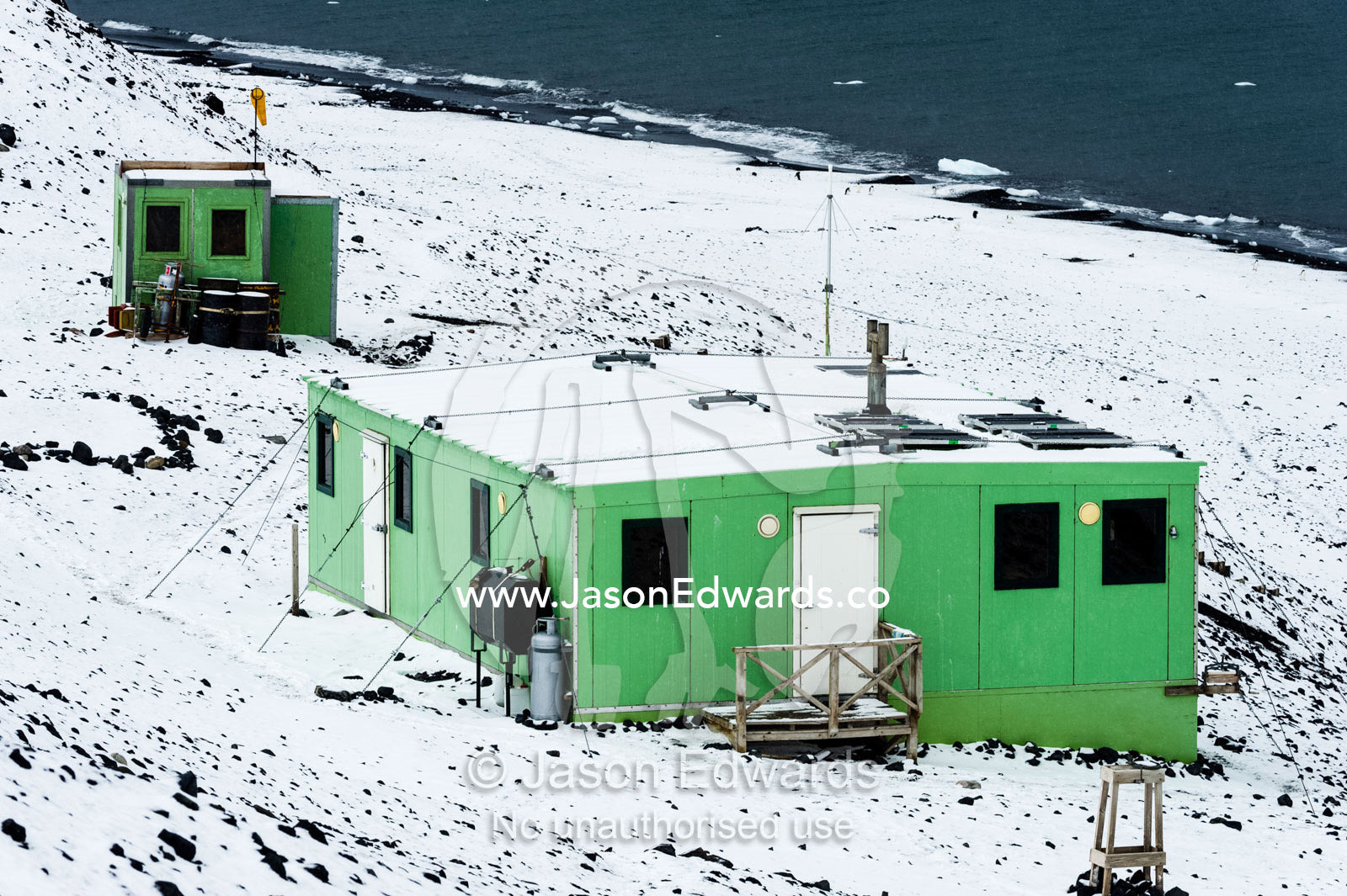 Solar panels run a remote Adelie Penguin research station in Antarctica. Caughley Beach, Cape Bird, Ross Island, Antarctica.
