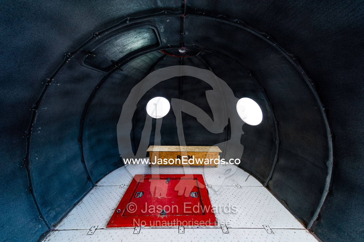 An igloo with a trapdoor for accessing the sea ice is known as an apple. McMurdo Station, Ross Island, Antarctica.