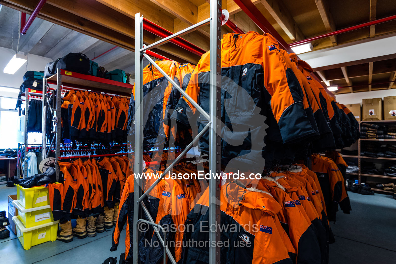 Extreme cold weather clothing for staff and researchers working in Antarctica in a storage room. Antarctica New Zealand, Christchurch, New Zealand.