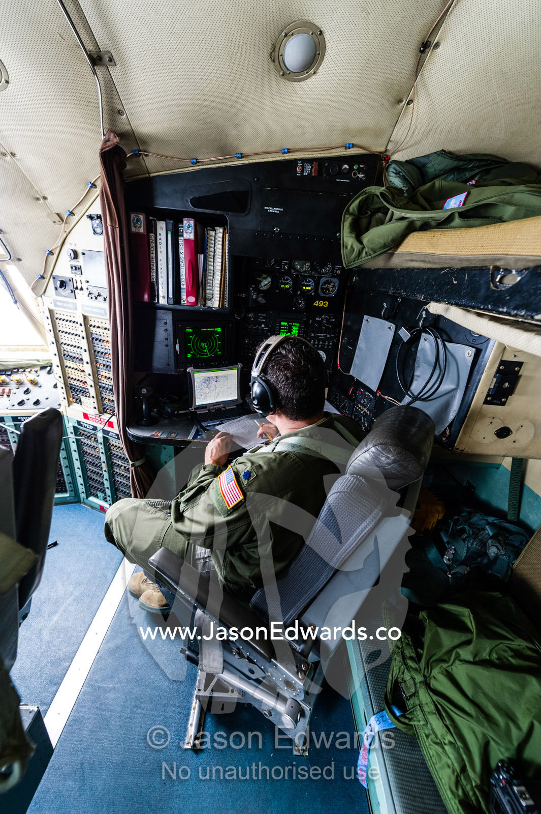 A US air force Hercules flight crew in the cockpit flying to Antarctica. Southern Ocean, between New Zealand and Antarctica.