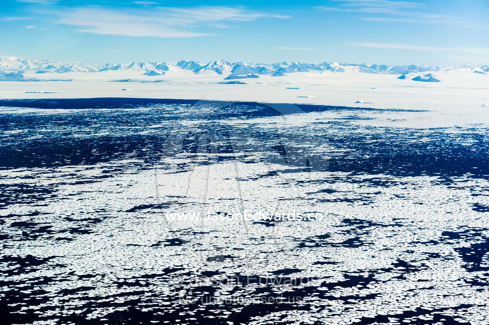 The remnants of sea ice float on the open ocean during the Antarctic summer. McMurdo Sound, Ross Sea, Antarctica.