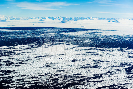 The remnants of sea ice float on the open ocean during the Antarctic summer. McMurdo Sound, Ross Sea, Antarctica.
