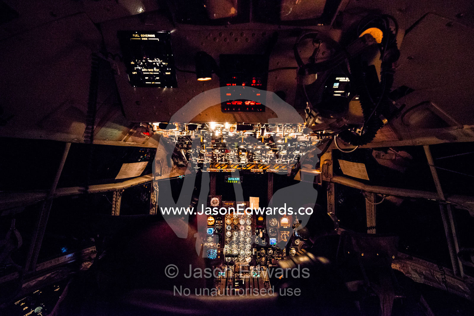 The cockpit dashboard lights of a US Air force Hercules flying to Antarctica at night. Ross Sea, Antarctica.