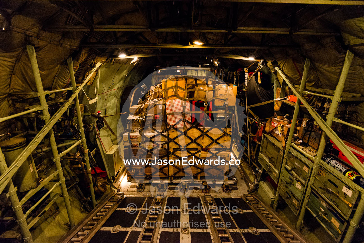 The cargo hold of a US Air force Hercules flying to Antarctica at night. Ross Sea, Antarctica.