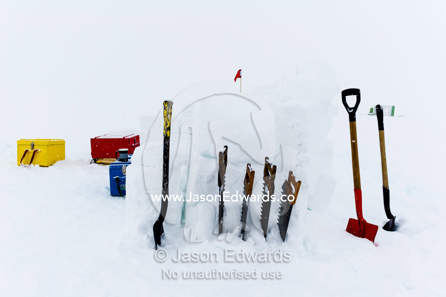 Snow shovels and ice saws used to make a kitchen shelter during a survival course on the sea ice. Windless Bight, Ross Ice Shelf, Ross Island, Antarctica.