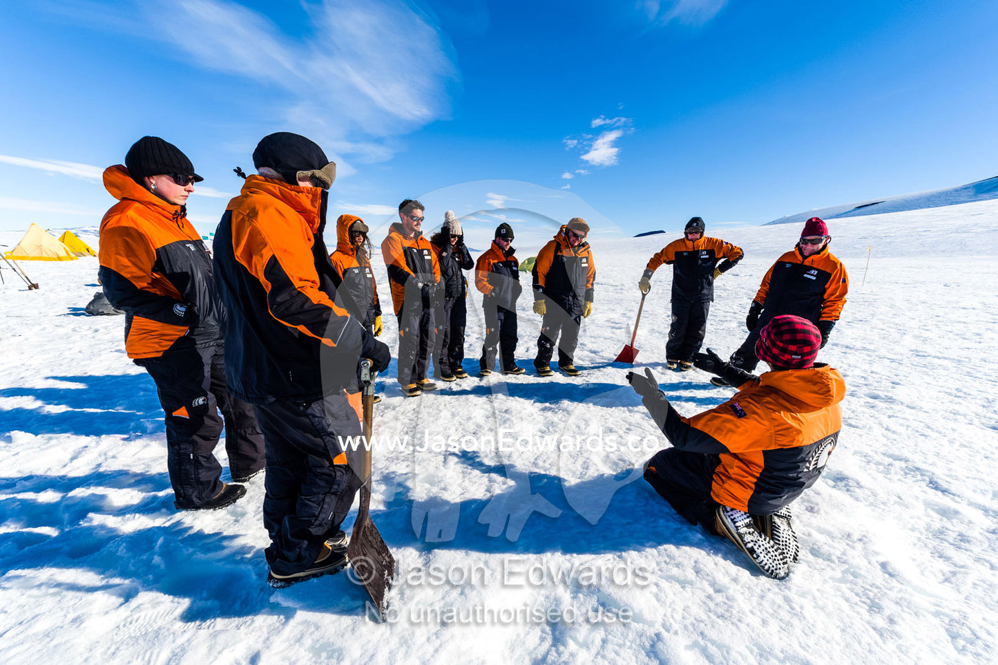 A field instructor teaches Antarctic staff survival skills on the sea ice. Windless Bight, Ross Ice Shelf, Ross Island, Antarctica.