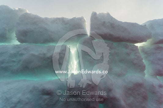 Sleeping pits in the sea ice carved from blocks of ice. Windless Bight, Ross Ice Shelf, Ross Island, Antarctica.