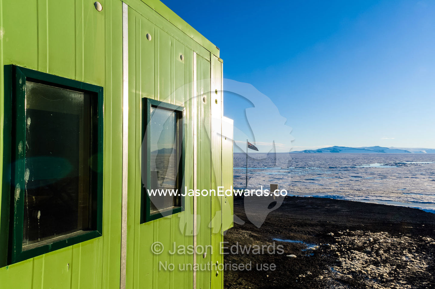 The insulated green external wall of Scott Base in Antarctica. Scott Base, Pram Point, Hut Point Peninsula, Ross Island, Antarctica.