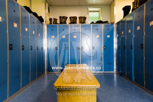 Clothing lockers and extreme cold weather ice boots in a change room in Antarctica. Scott Base, Pram Point, Hut Point Peninsula, Ross Island, Antarctica.