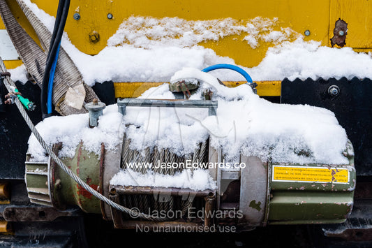 Snow piled on a winch on a Hagglund ice vehicle. Castle Rock Road, Hut Point Peninsula, Ross Island, Antarctica.