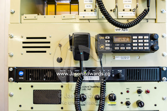 A Tait T700 VHF mobile radio, the local CH16 VHF repeater and a remote HF clarifier which is used to clean up the HF signal when it is extended to the PA monitor circuit. Scott Base, Pram Point, Hut Point Peninsula, Ross Island, Antarctica.