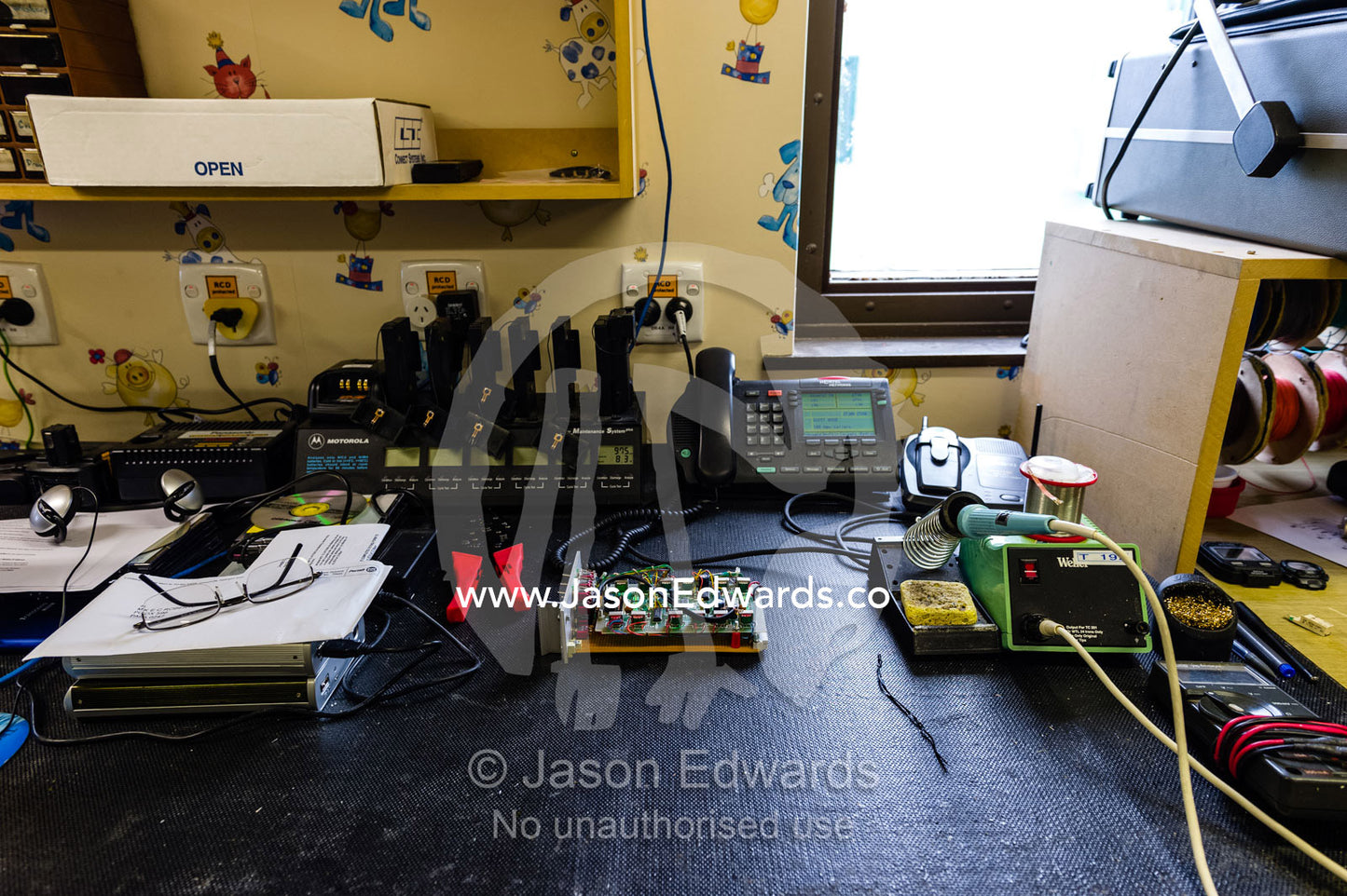 A Telecom workbench with a circuit board being built. Scott Base, Pram Point, Hut Point Peninsula, Ross Island, Antarctica.