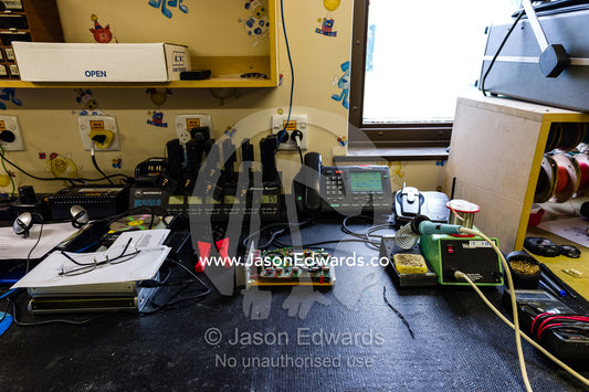 A Telecom workbench with a circuit board being built. Scott Base, Pram Point, Hut Point Peninsula, Ross Island, Antarctica.
