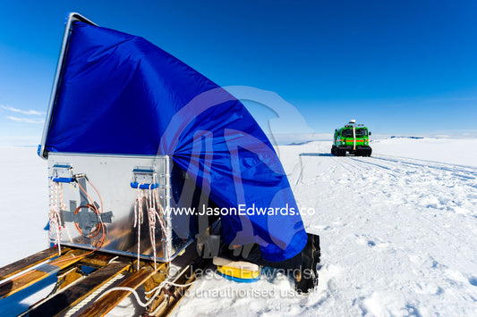 Using radar a scientist sends radio waves to the base of the ice and measures the return time to measure the thickness. Windless Bight, Ross Ice Shelf, Ross Island, Antarctica.