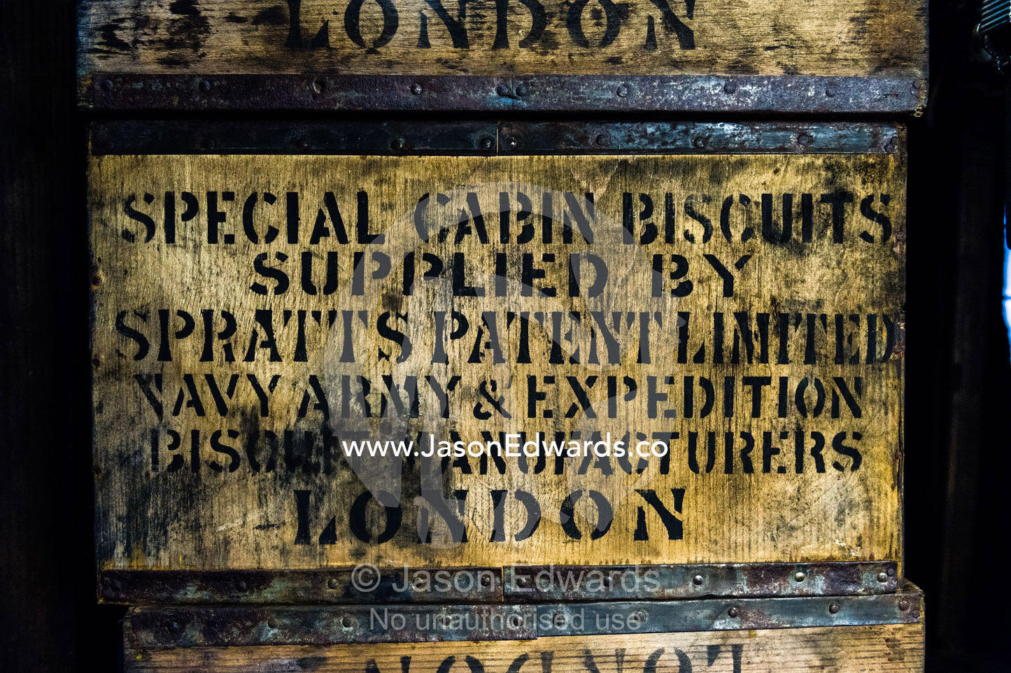 An antique timber box of explorers biscuits preserved in Discovery Hut in Antarctica. Discovery Hut, Hut Point, Ross Island, Antarctica.