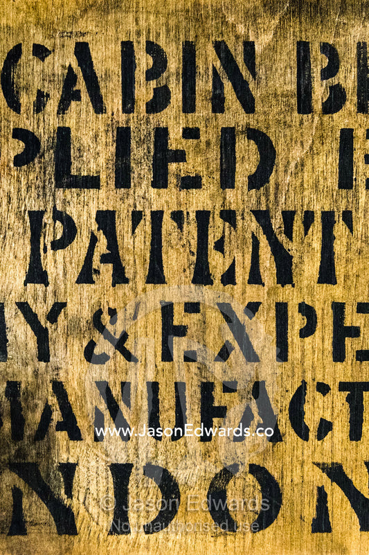 Ink printing on an antique timber box of explorers biscuits preserved in Discovery Hut in Antarctica. Discovery Hut, Hut Point, Ross Island, Antarctica.
