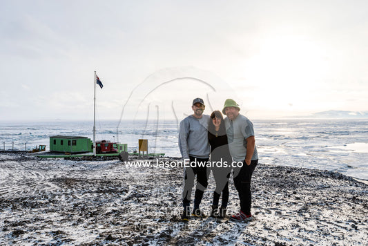 Friends gather beneath the midnight sun in Antarctica. Scott Base, Pram Point, Hut Point Peninsula, Ross Island, Antarctica.