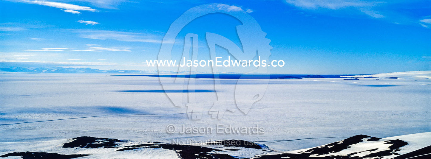 The frozen sea ice and expanding ocean ice edge during the Antarctic summer. McMurdo Sound, Ross Sea, Antarctica.