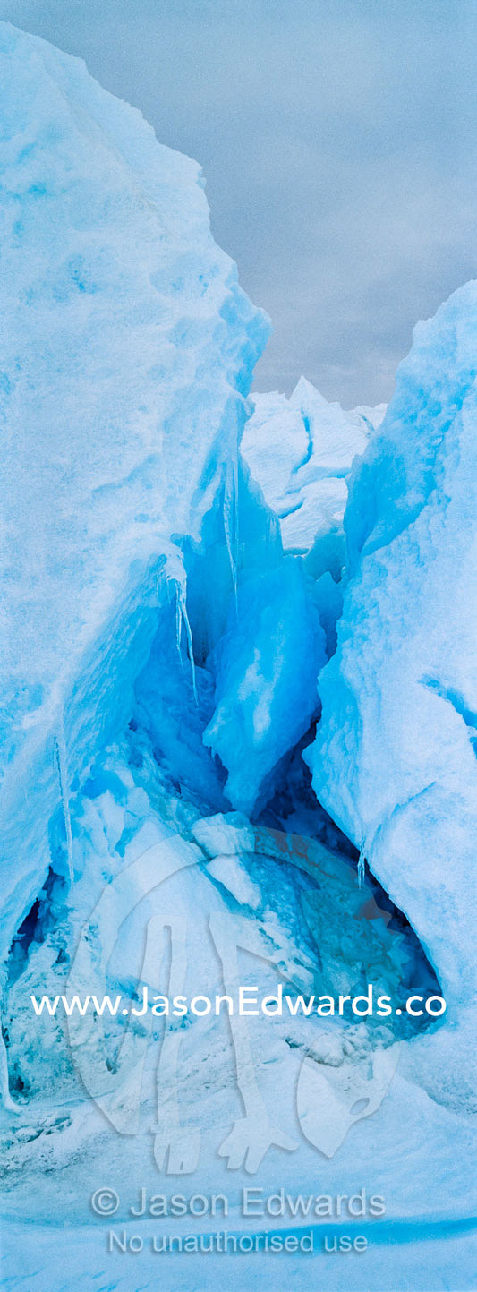 Fractured ice blocks pushed skywards along pressure ridges in the sea ice. Turtle Rock, Erebus Bay, McMurdo Sound, Ross Island, Antarctica.
