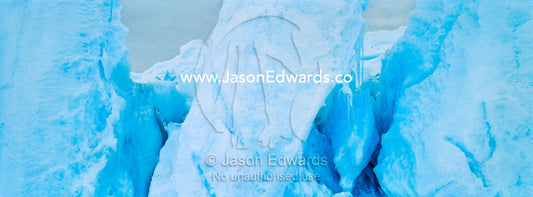 Fractured ice blocks pushed skywards along pressure ridges in the sea ice. Turtle Rock, Erebus Bay, McMurdo Sound, Ross Island, Antarctica.