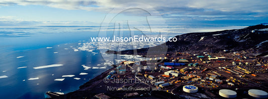 The enormous oil tanks and sprawling facilities of McMurdo Station the largest base in Antarctica. McMurdo Station, Ross Island, Antarctica.