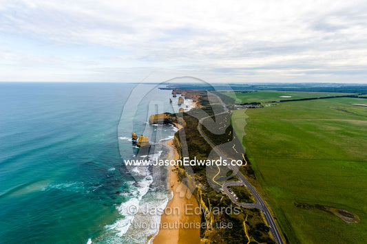 An aerial view of the sheer limestone cliffs and the Twelve Apostles pillars. Twelve Apostles, Port Campbell National, Great Ocean Road, Victoria, Australia.