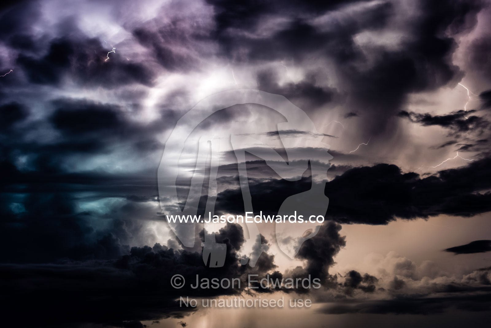 A violent electrical storm flashes lightning above a floodplain. Chobe River, Chobe National Park, Botswana.