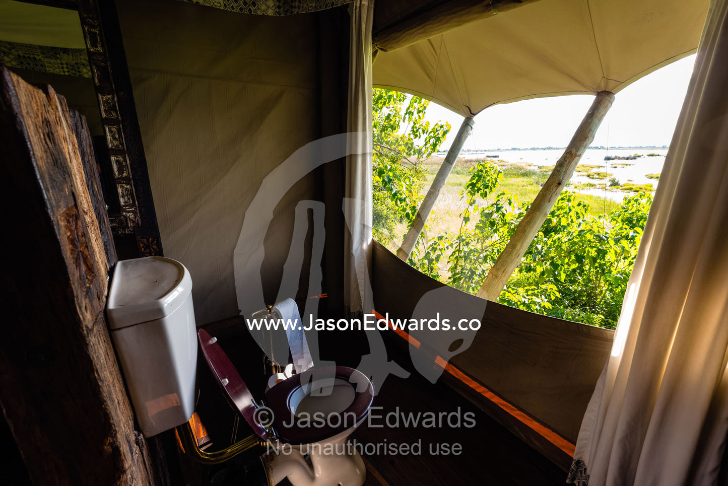 An open-air toilet in a luxury safari camp tent. Zarafa Camp, Zibadianja Lagoon, Savute Channel, Linyanti, Botswana.