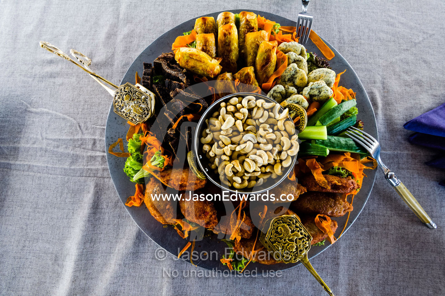 Nuts and canape's served on a river barge on a luxury safari. Zarafa Camp, Zibadianja Lagoon, Savute Channel, Linyanti, Botswana.