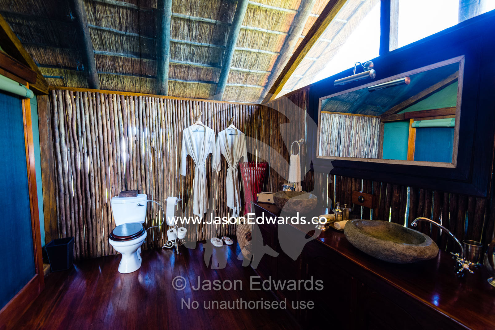 A bathroom and toilet in a luxurious safari camp tent. Selinda Camp, Selinda Reserve, Linyanti Region, Northern Botswana.