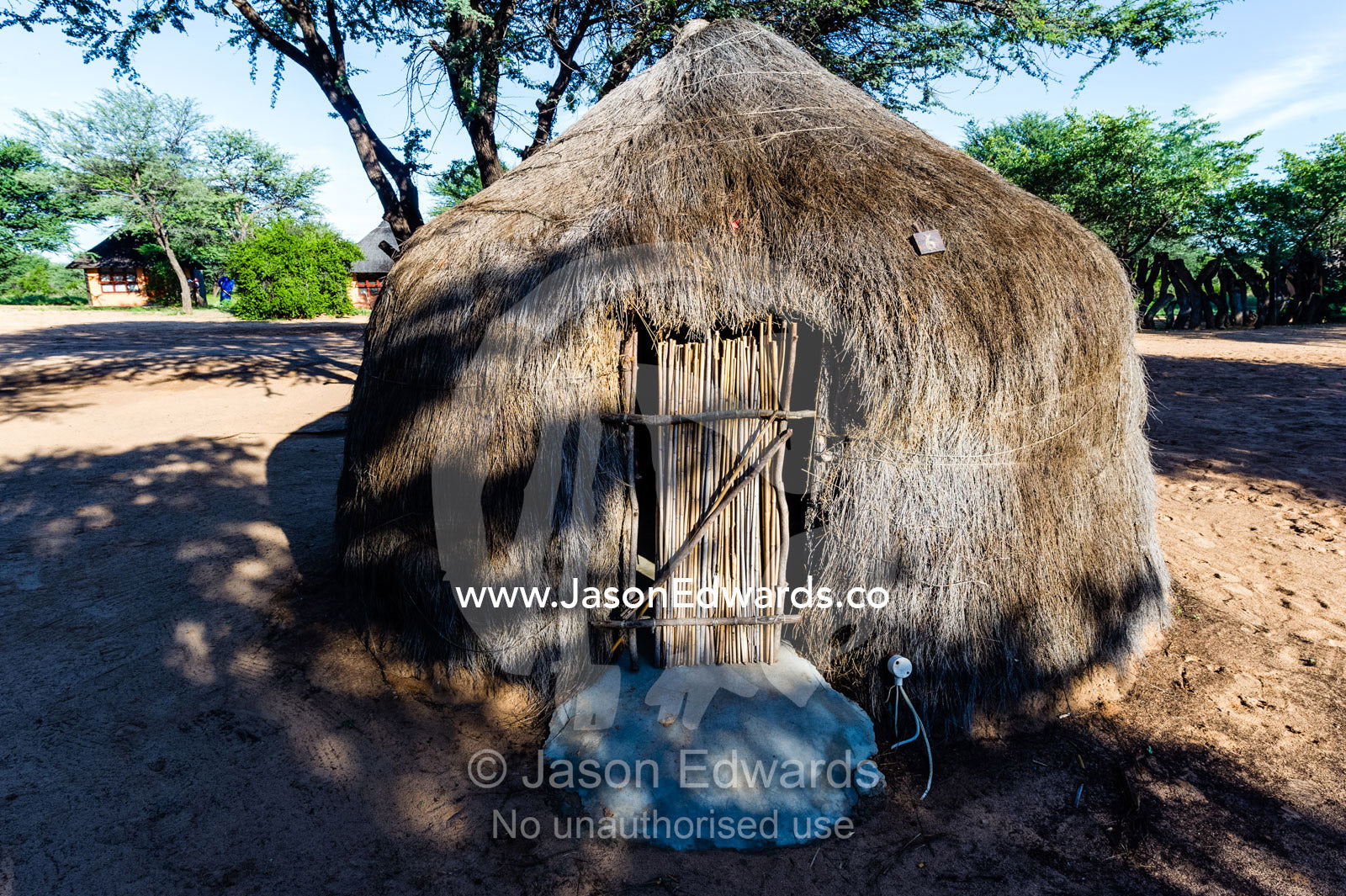 A thatched hut for tourists to sleep in the Kalahari. Kalahari Desert, Botswana.