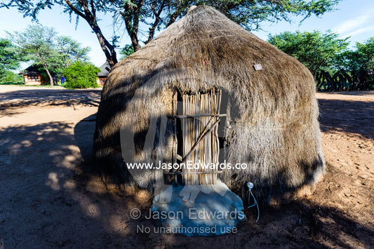 A thatched hut for tourists to sleep in the Kalahari. Kalahari Desert, Botswana.