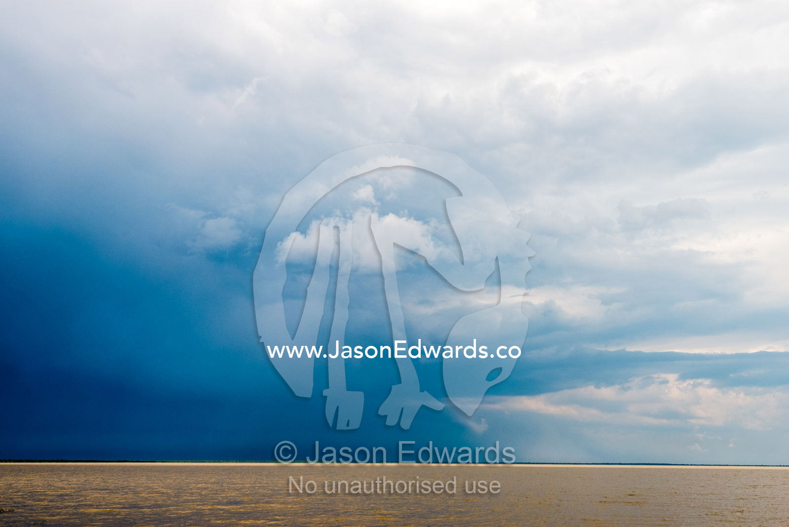 An inland sea forms when floodwater fills a salt pan. Makgadikgadi Pans, Botswana.