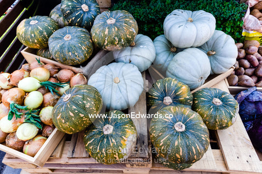 A display of onions and pumpkins at an agricultural show. Royal Melbourne Show, Flemington, Melbourne, Victoria, Australia.