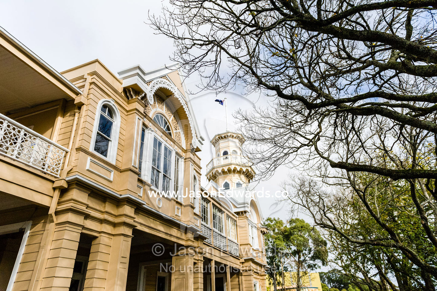 The antique facade and tower of an historic school in rural Victoria. Braemar College, Woodend, Victoria, Australia.