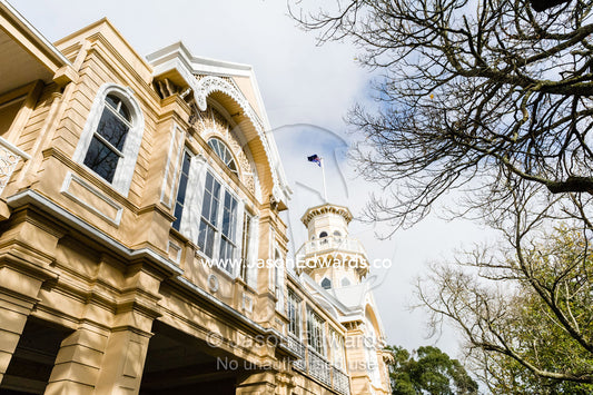 The antique facade and tower of an historic school in rural Victoria. Braemar College, Woodend, Victoria, Australia.