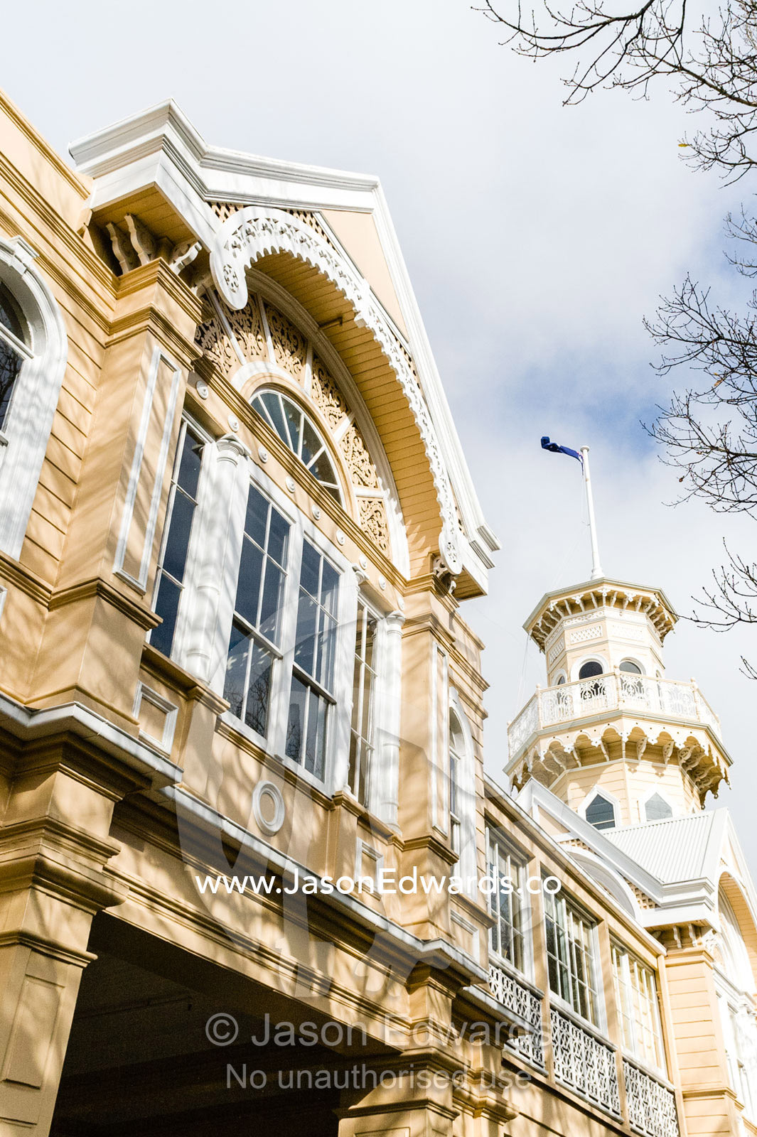 The antique facade and tower of an historic school in rural Victoria. Braemar College, Woodend, Victoria, Australia.